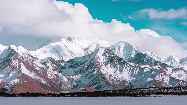 4K60P延时摄影 晴天雪地雪山云雾变化视频视频素材