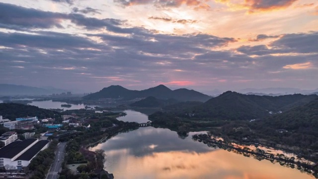 杭州萧山湘湖落日火烧云航拍大范围延时视频素材