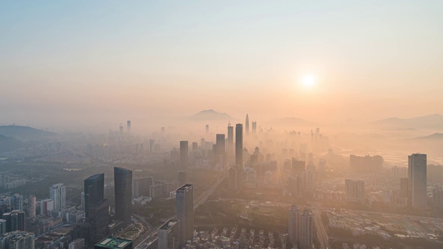 平流雾天气下的深圳城市天际线日出晨曦视频素材