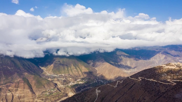 中国云南迪庆藏族自治州德钦县梅里雪山航拍延时摄影视频素材