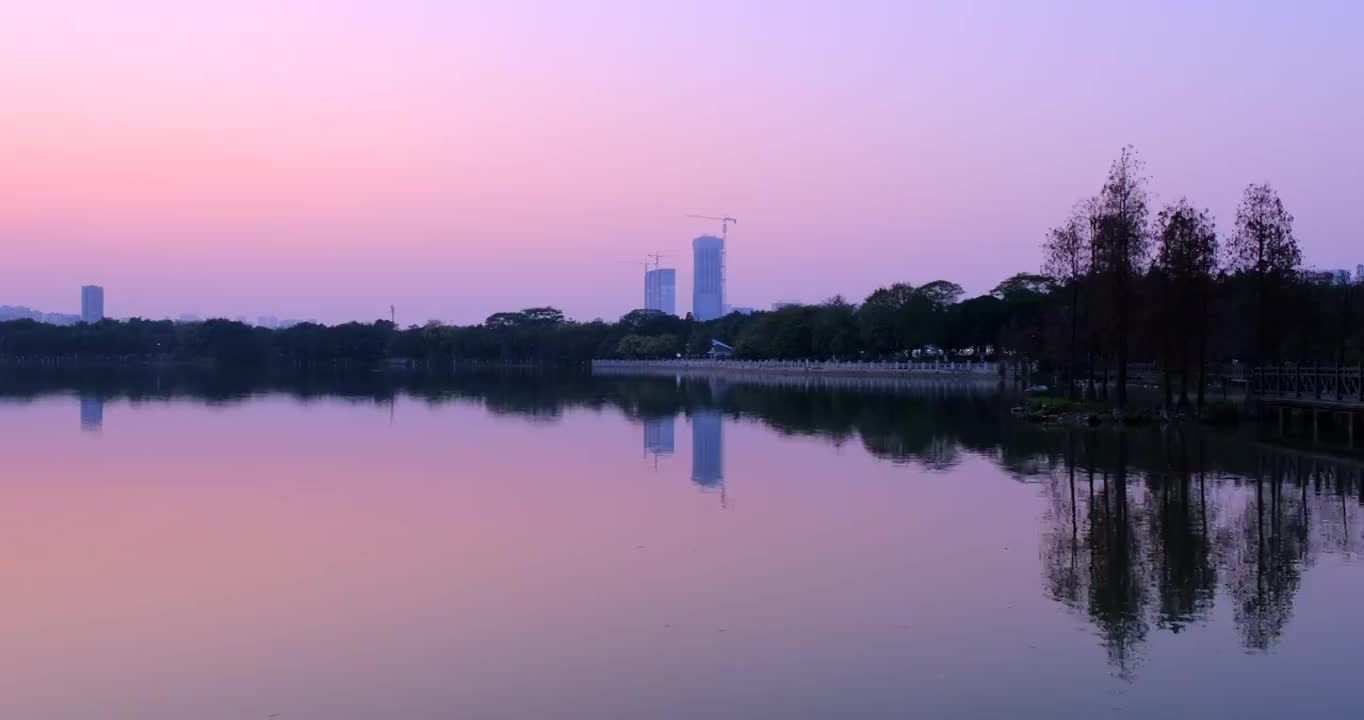 中国广州海珠湖公园夕阳落日风光全景视频素材