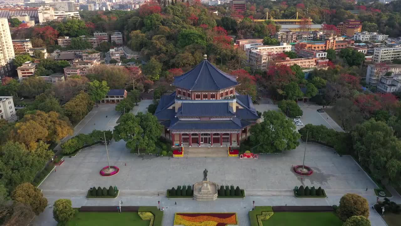 航拍木棉花盛开的广州中山纪念堂视频素材