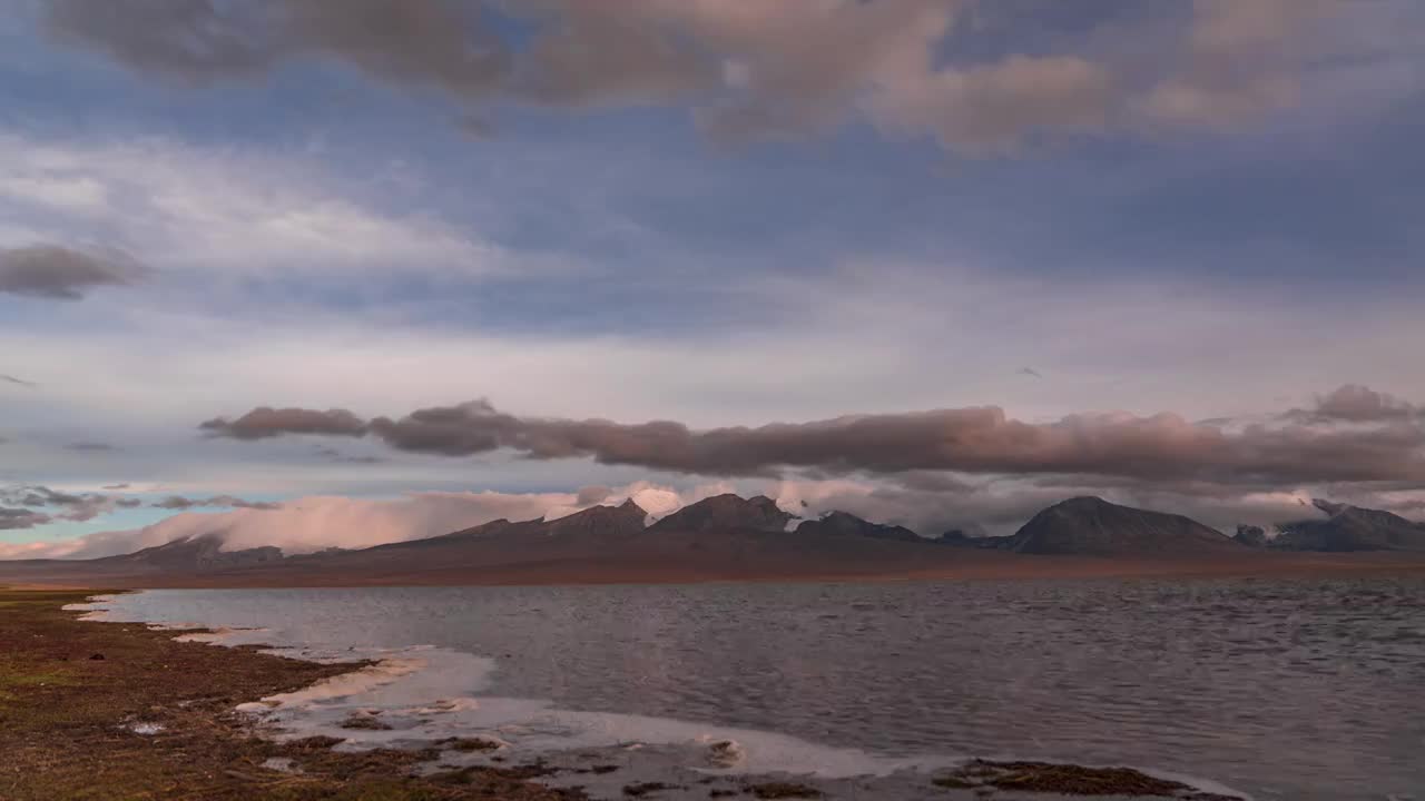 延时摄影西藏风光多庆措卓木拉日雪山日落夕阳视频素材