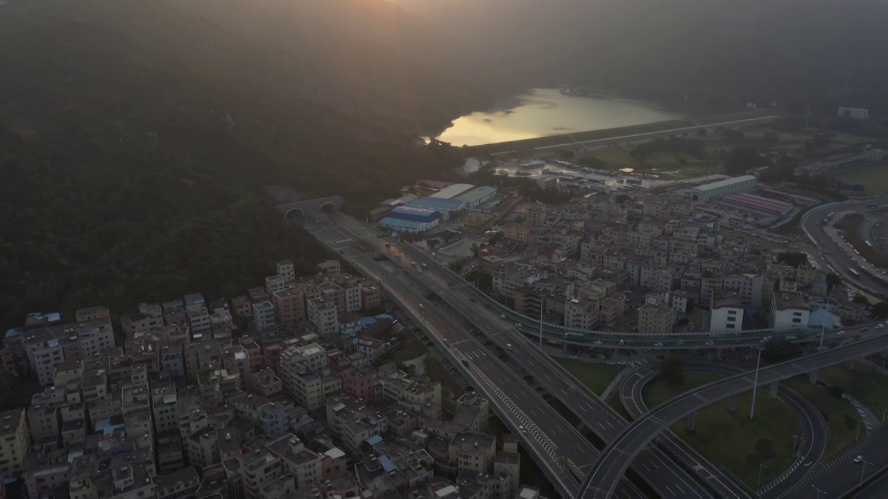 广东省珠海加林山隧道日落城市风光航拍视频素材