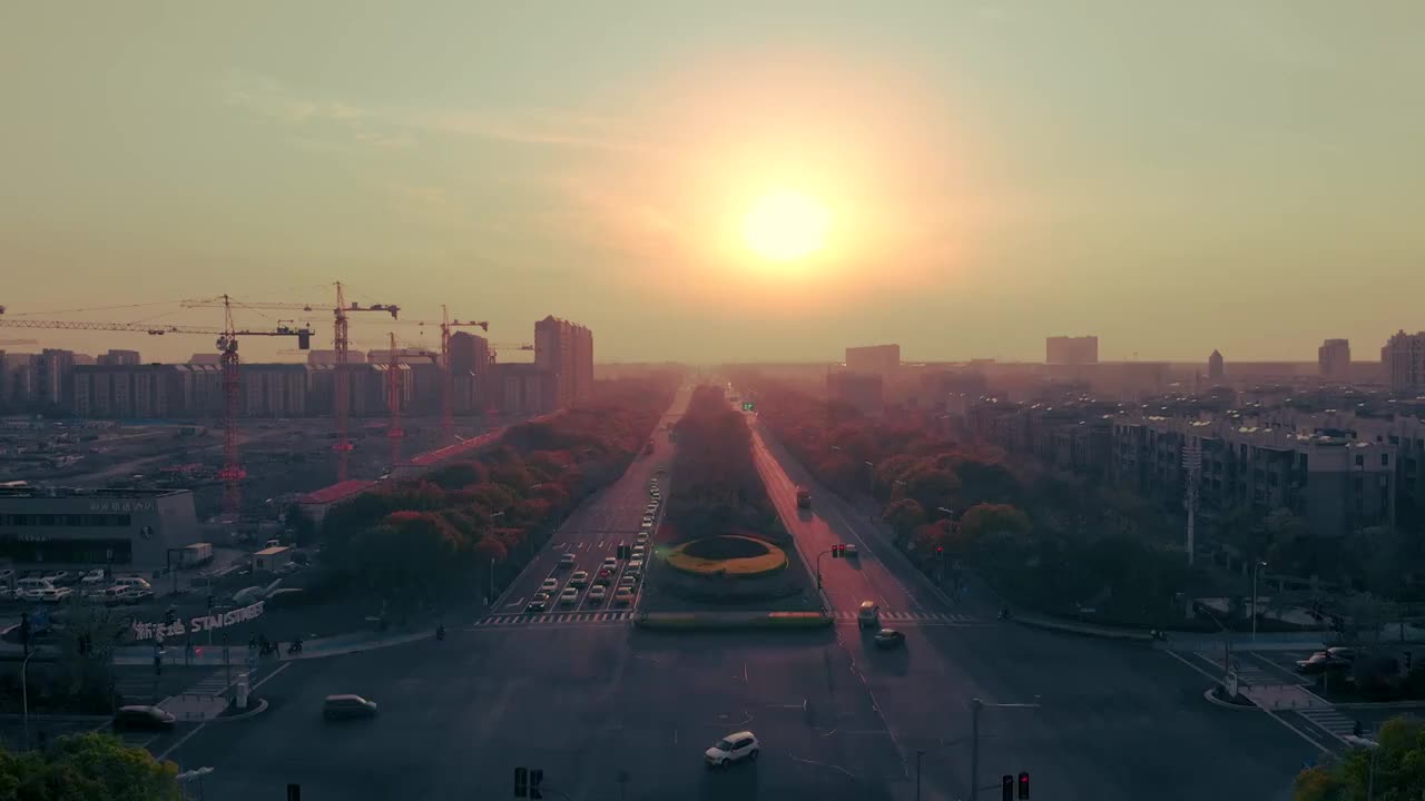 航拍日落时的上海临港新区城市马路实景空境视频素材