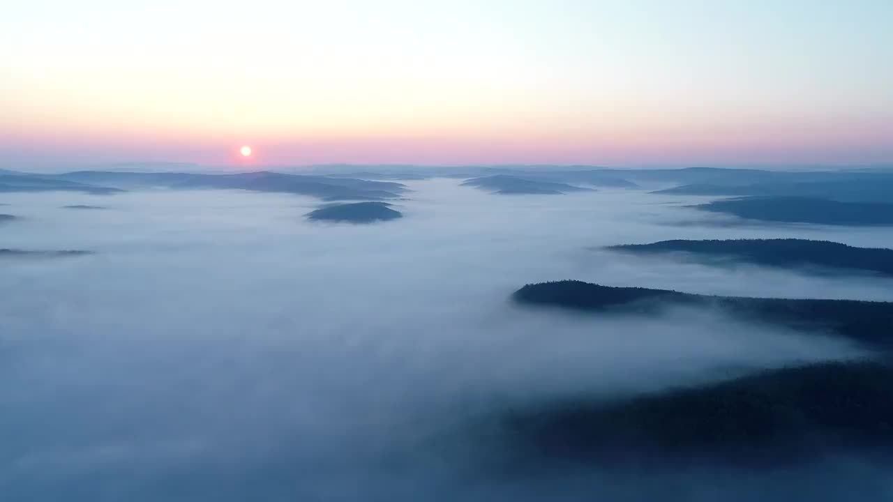 航拍大兴安岭山岭林海云雾日出视频素材