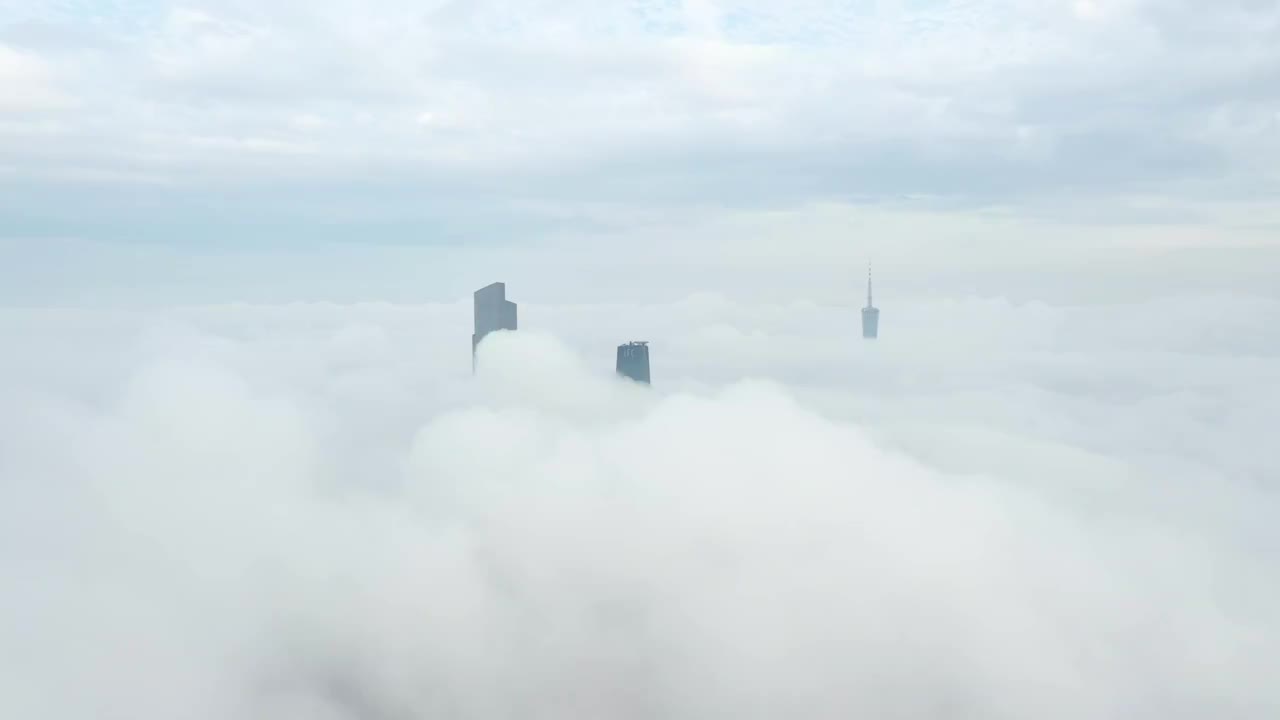 航拍雨后云海之上的广州三塔视频素材