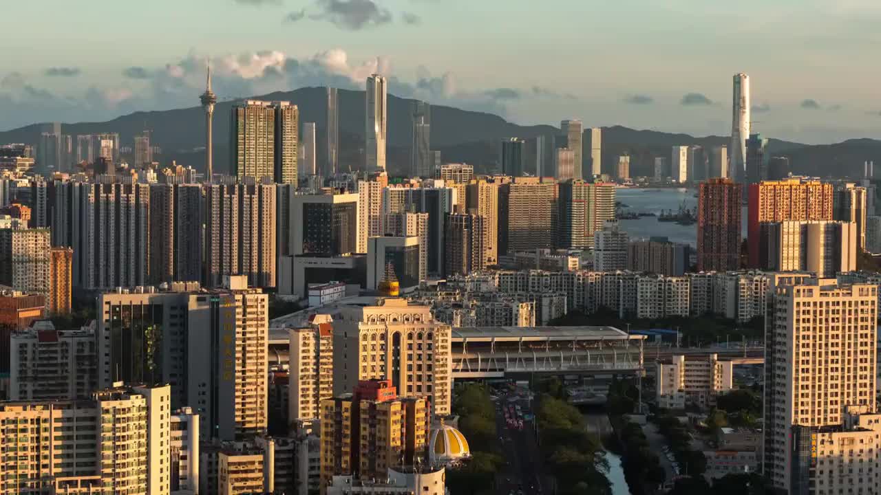 珠海横琴与澳门的天际线城市风光日转夜延时视频素材