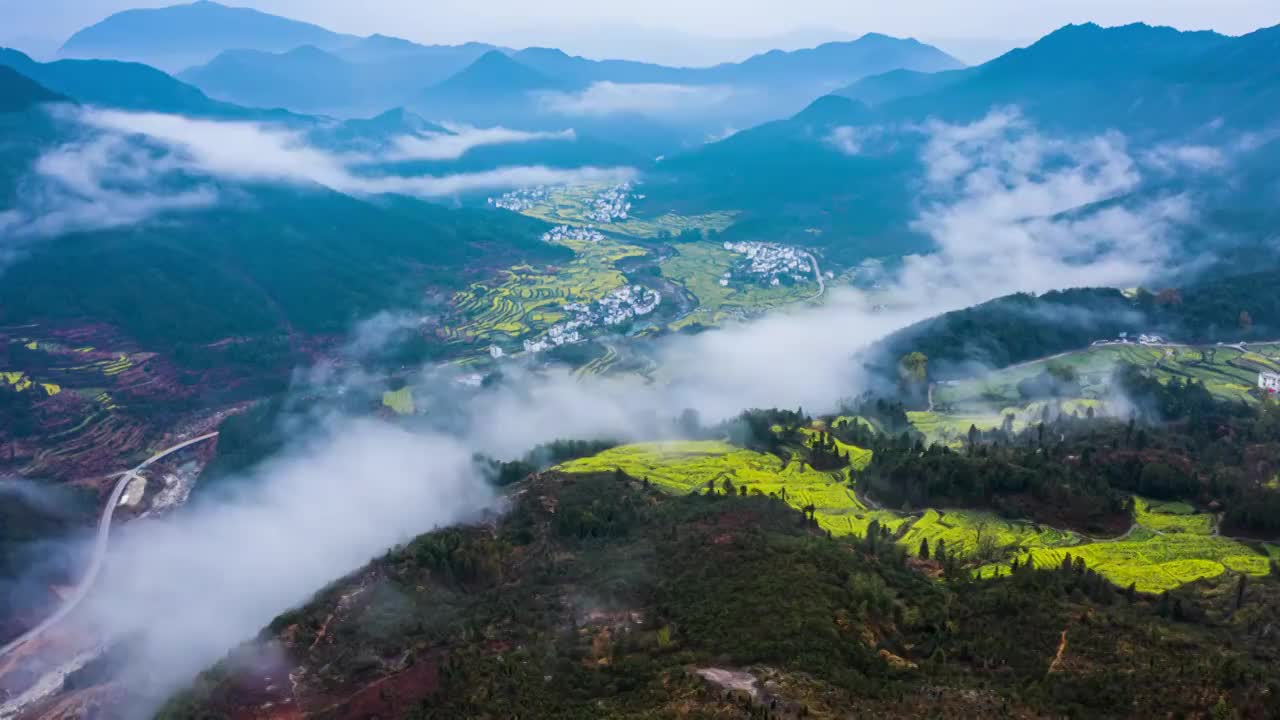 江西婺源江岭景区油菜花海云海风光4K延时航拍短片视频素材