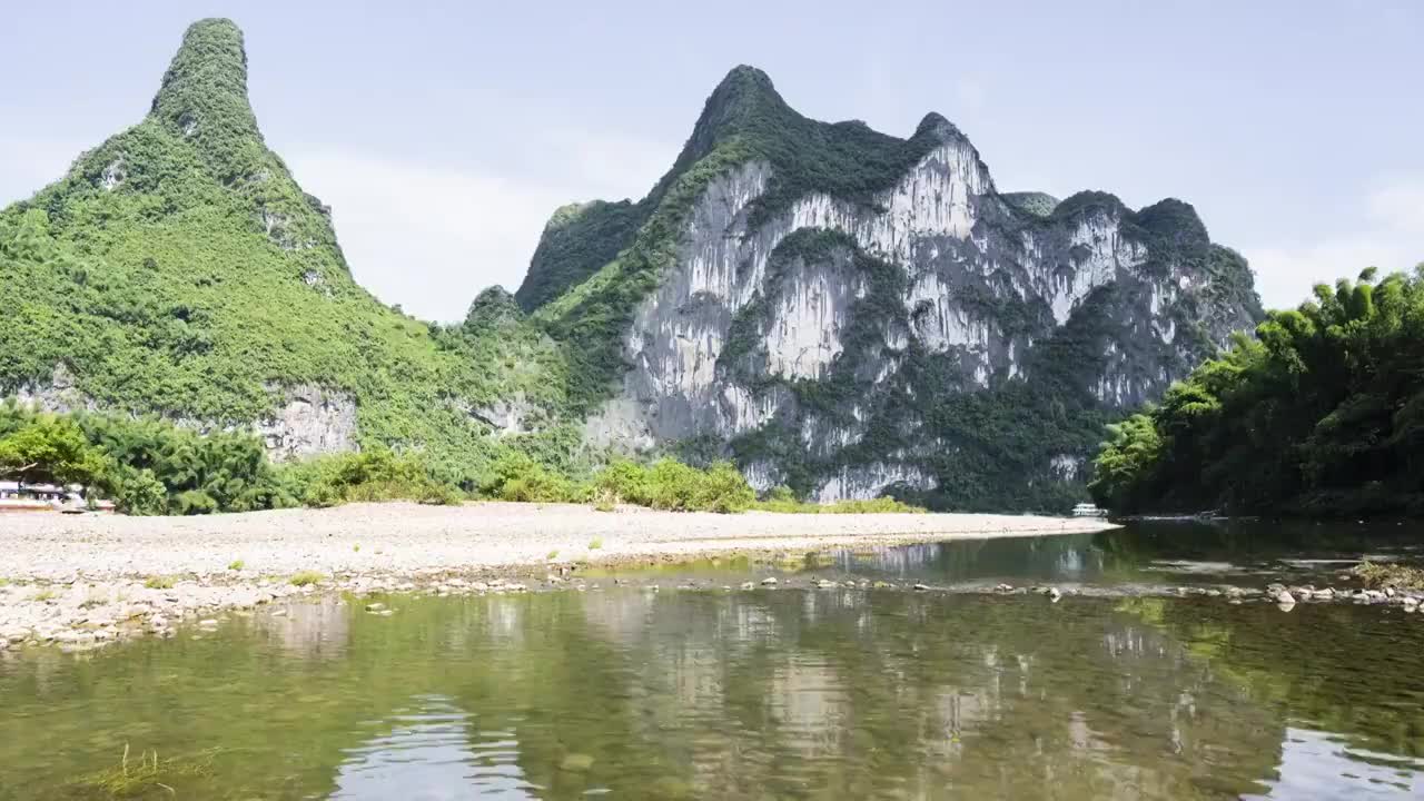 蓝天白云下桂林阳朔九马画山风景区风光视频素材