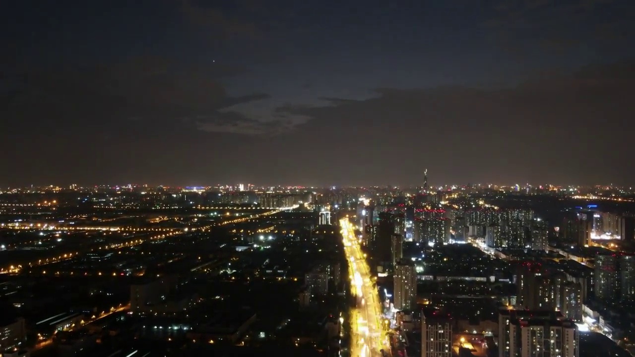 成都市龙泉驿区夜晚市区城市主干道航拍夜景建筑视频素材