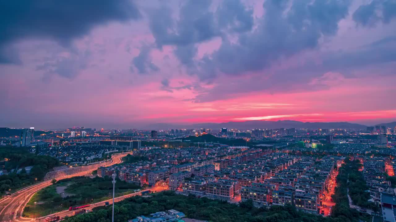 浙江义乌夏季城市晚霞夜景风光4K50P延时短片视频素材