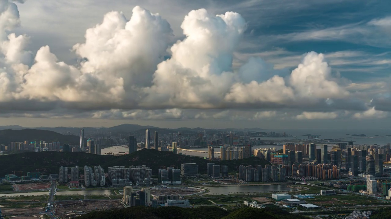 粤港澳大湾区珠海横琴与澳门天际线全景白昼延时视频素材