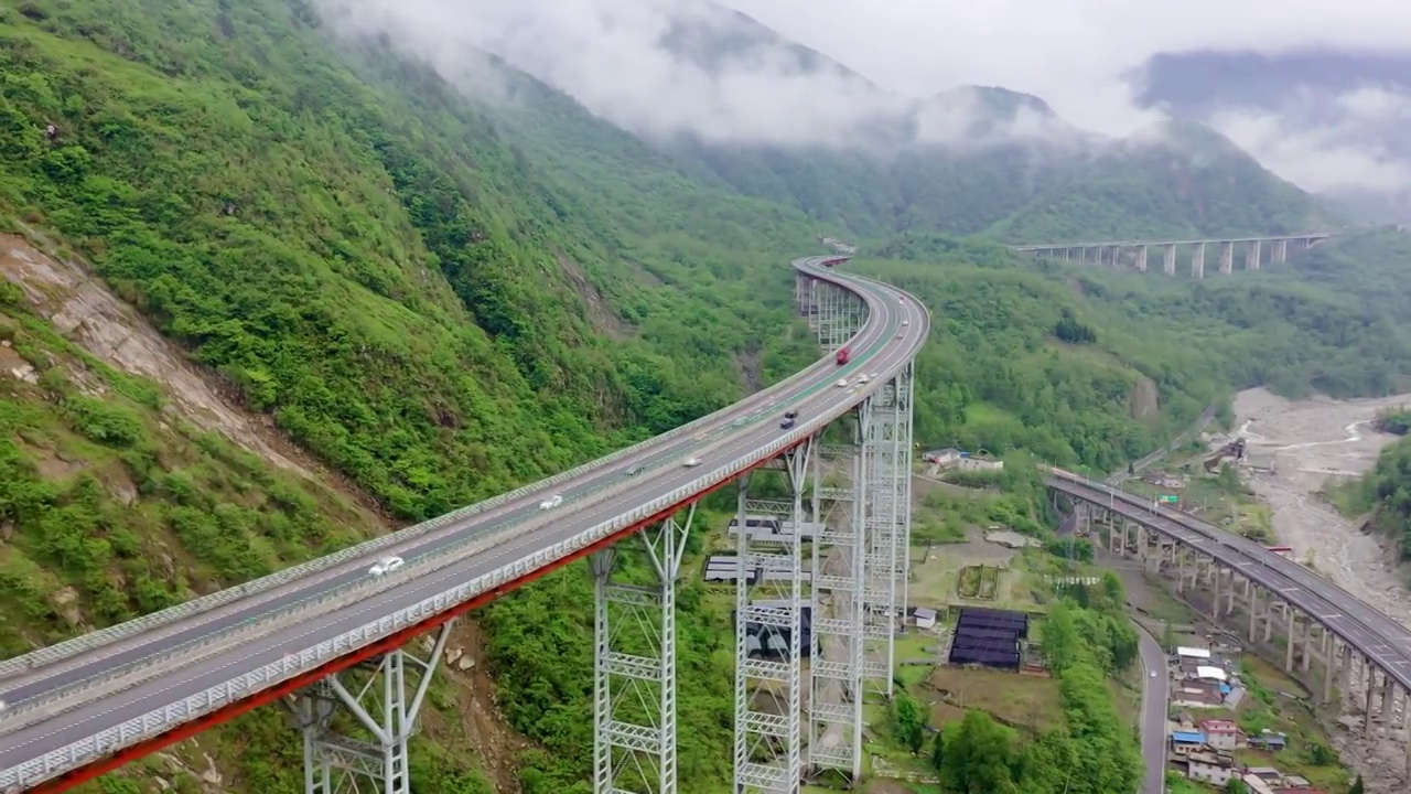 最美天路雅西高速公路干海子-铁寨子双螺旋隧道桥梁视频素材