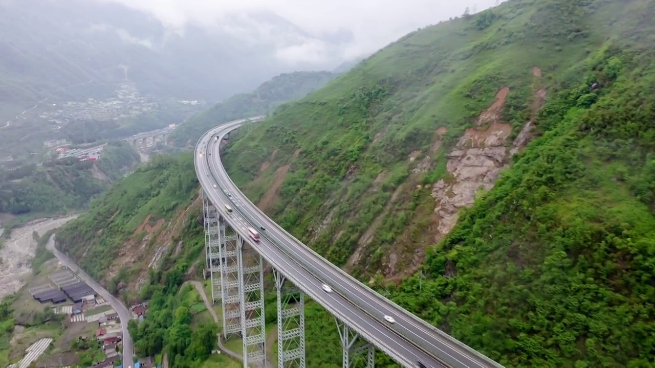 最美天路雅西高速公路干海子-铁寨子双螺旋隧道桥梁视频素材