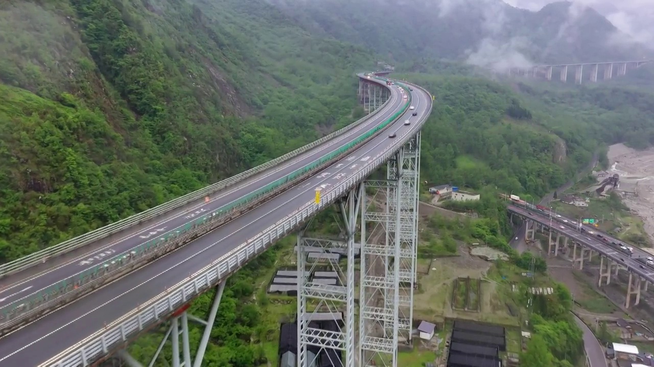 最美天路雅西高速公路干海子-铁寨子双螺旋隧道桥梁视频素材