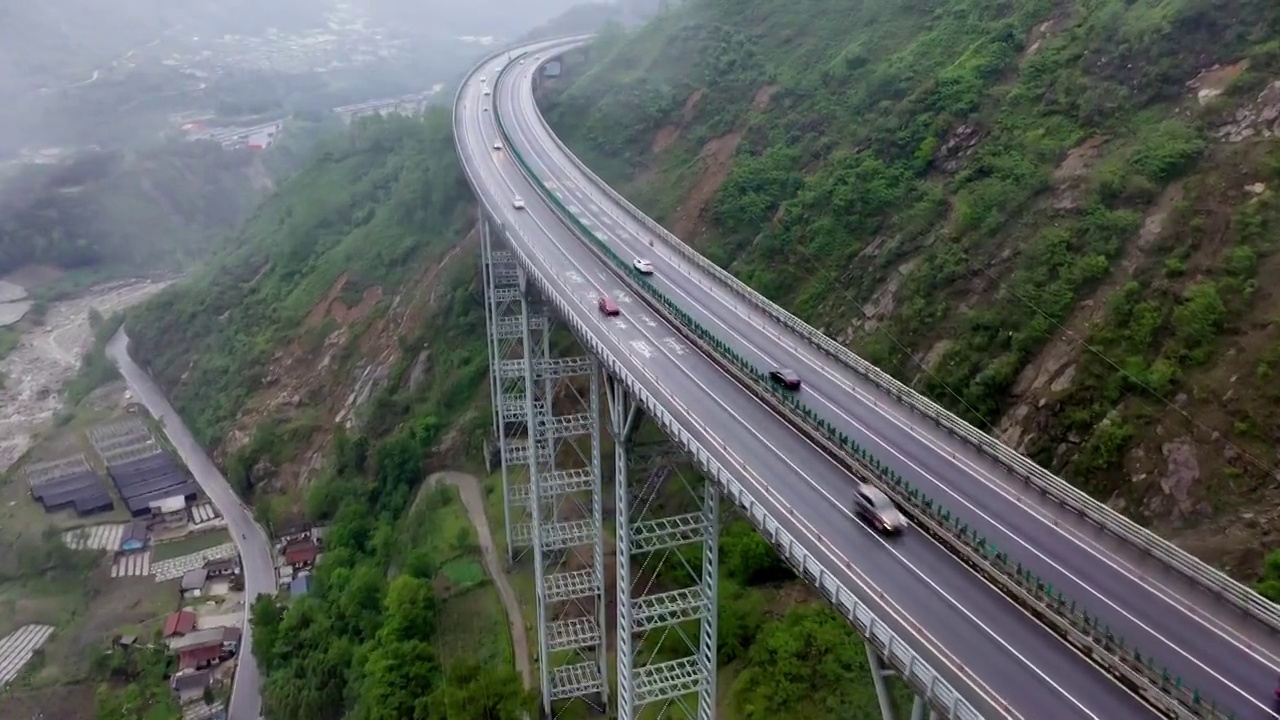 最美天路雅西高速公路干海子-铁寨子双螺旋隧道桥梁视频素材