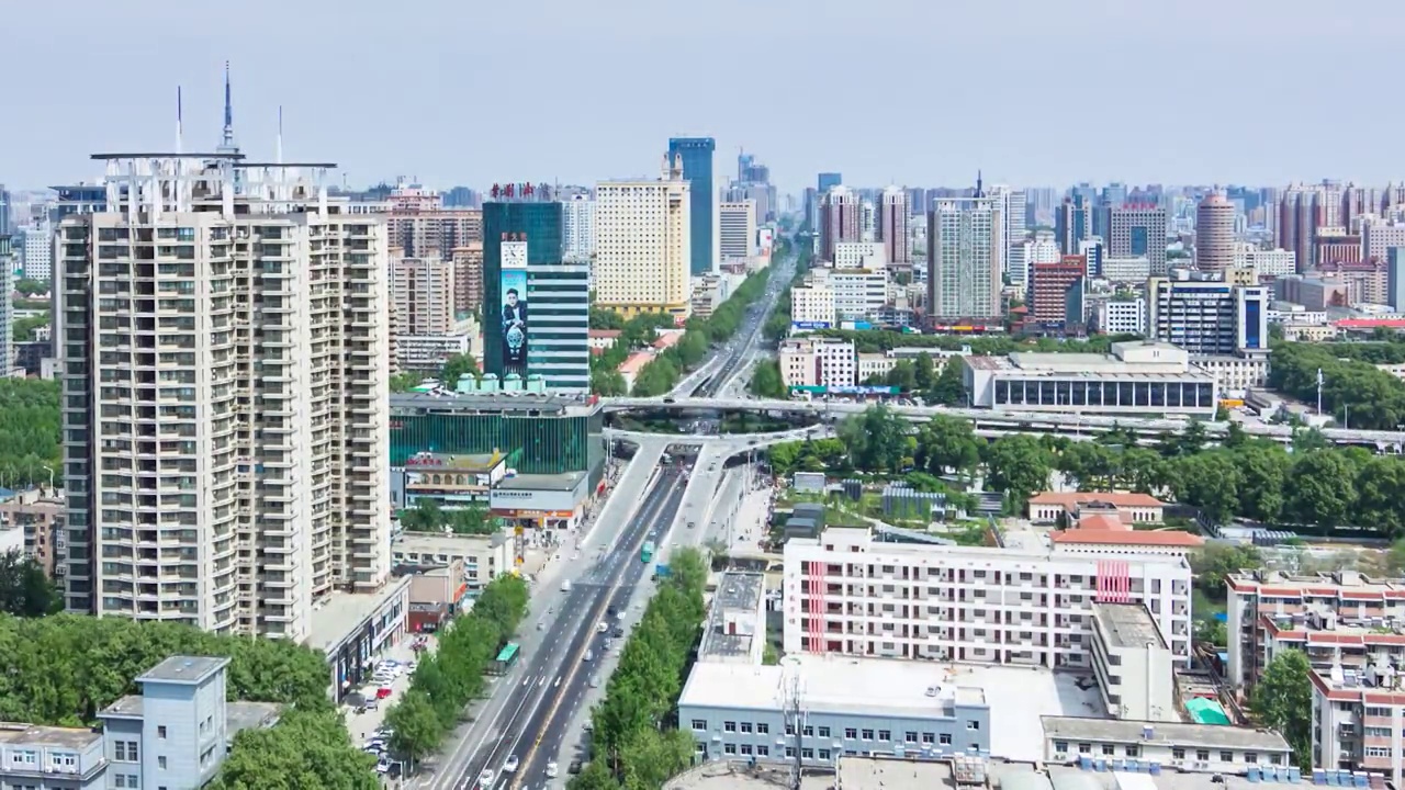 郑州市紫荆山路紫荆山市区城市建筑交通延时摄影夜景日落日转夜视频素材