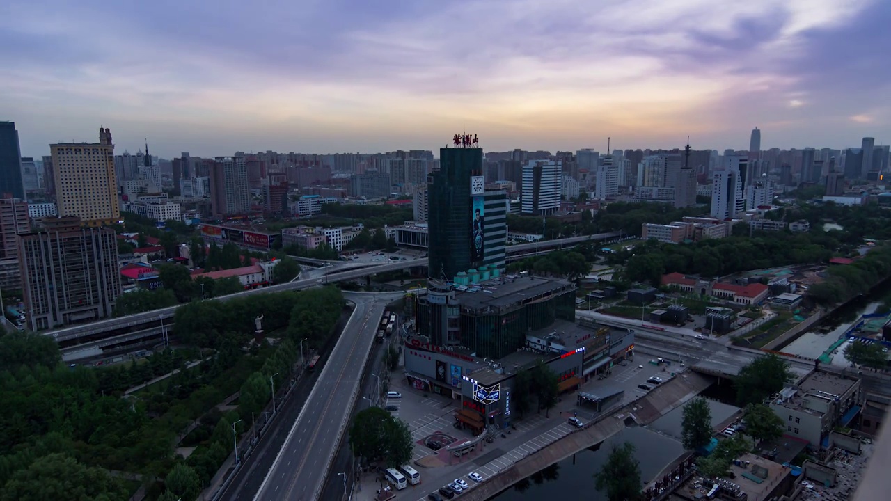 郑州市紫荆山路紫荆山市区城市建筑交通延时摄影夜景日落日转夜视频素材