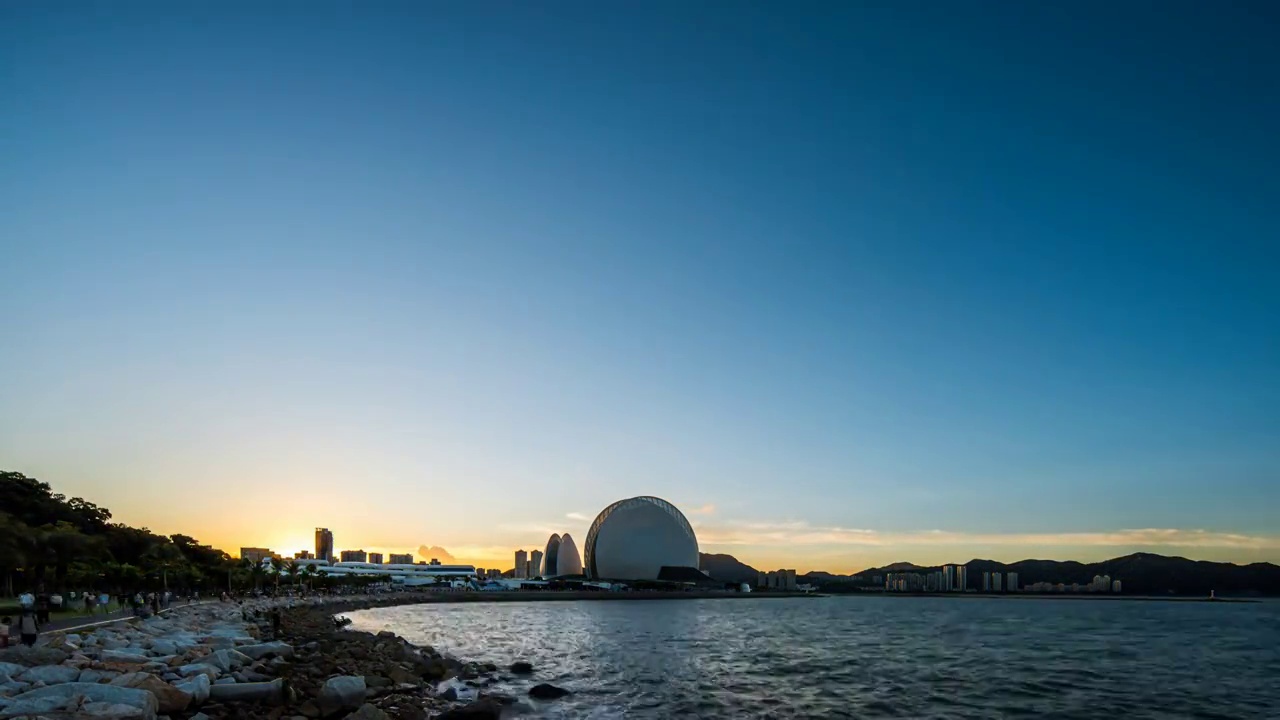 珠海大剧院滨水城市天际线日落夜景视频素材