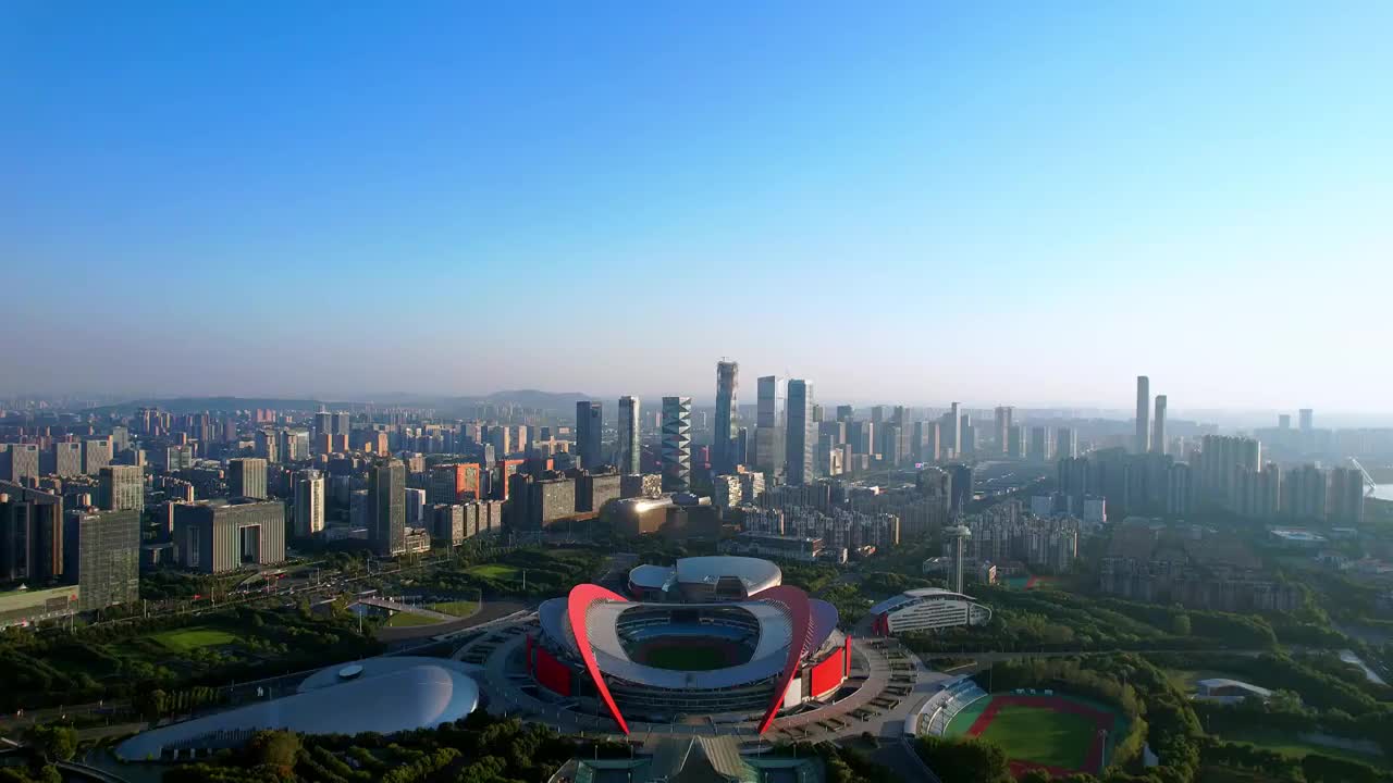 中国江苏南京奥体中心体育场和河西CBD城市天际线航拍风光视频素材