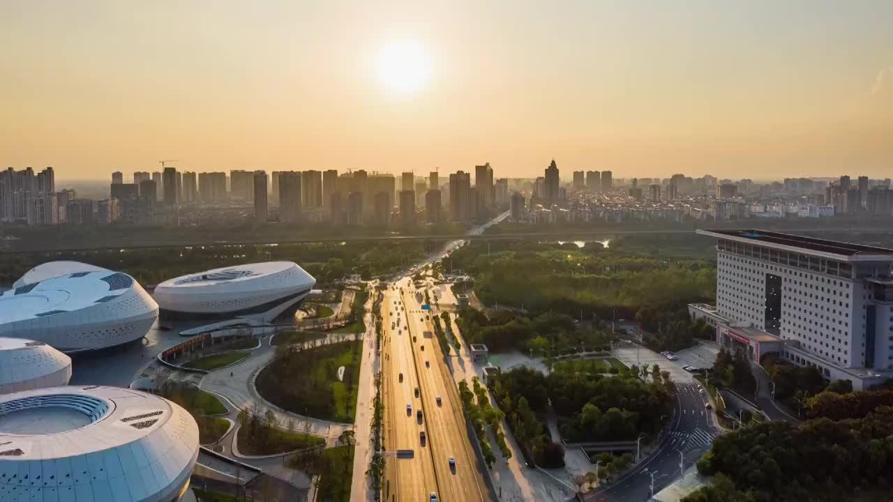 4k航拍孝感城市车流夕阳延时视频素材