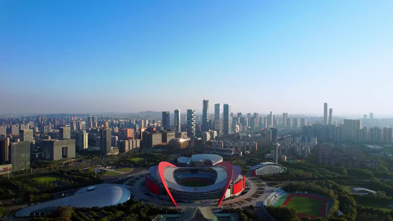 中国江苏南京奥体中心体育场和河西CBD城市天际线航拍风光视频素材