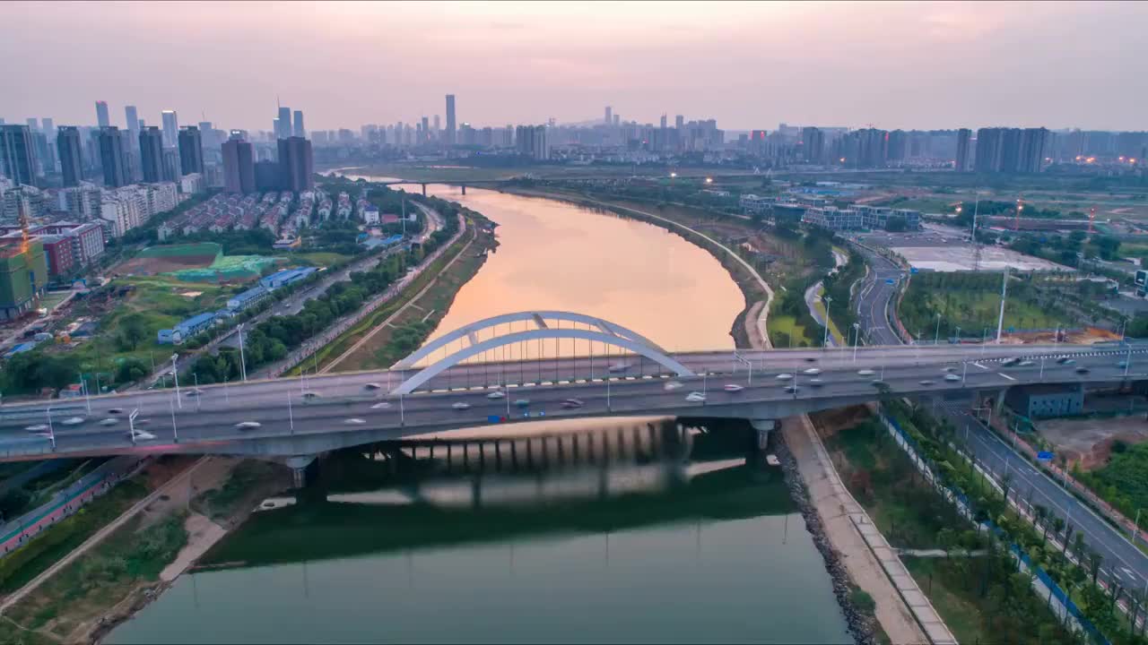 长沙市浏阳河万家丽路大桥夕阳航拍延时摄影视频素材