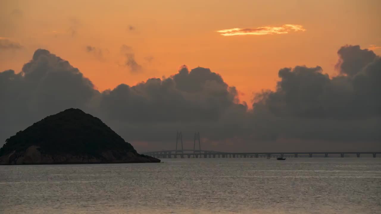 港珠澳大桥中国结日出4K延时视频视频素材