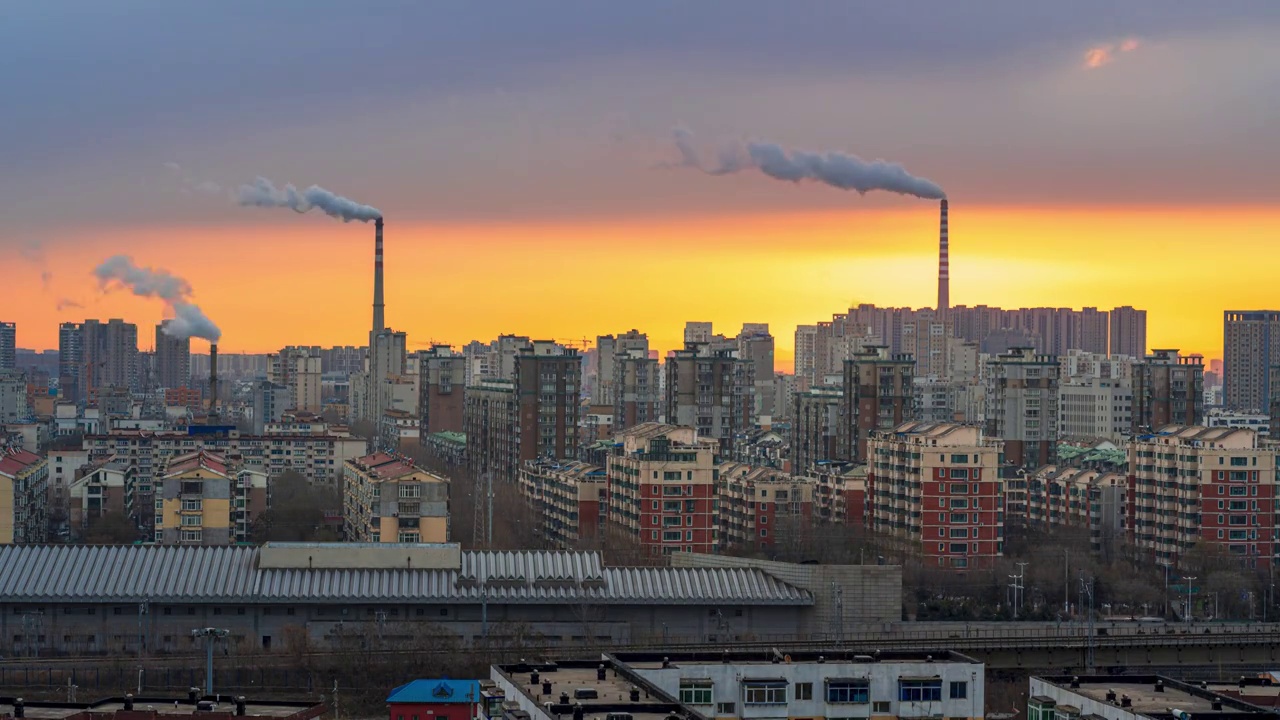 中国辽宁沈阳城市建筑日出烟囱延时摄影视频素材