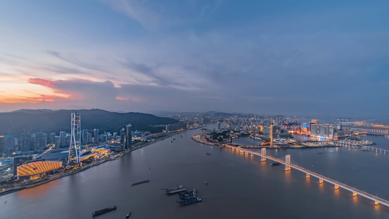 珠海十字门商务区珠海中心和澳门半岛日落亮灯延时视频素材