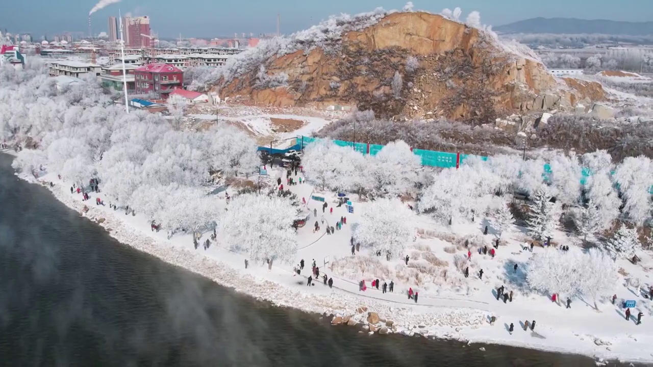 4k吉林雾凇航拍雪乡树挂松花江冬季风光视频素材