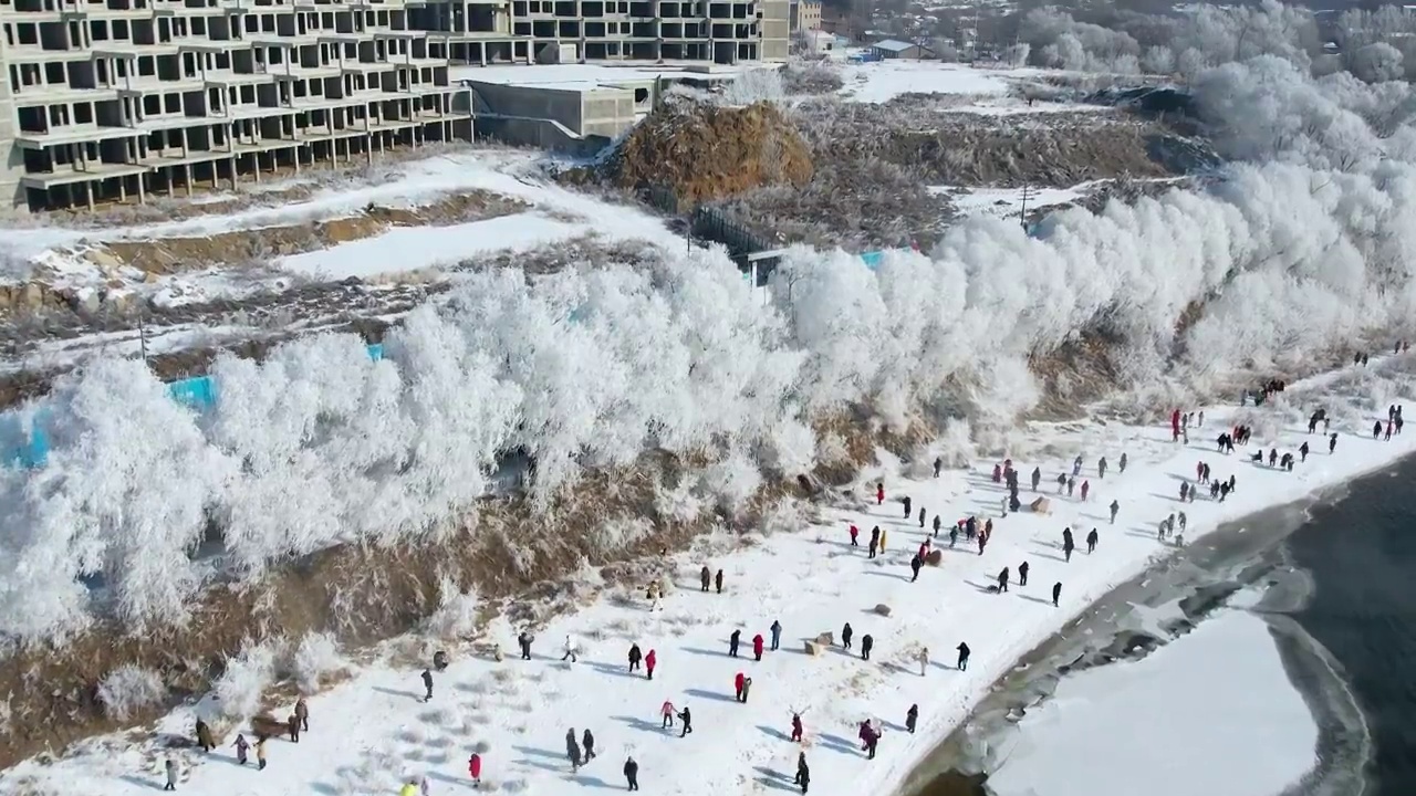 4k吉林雾凇航拍雪乡树挂松花江冬季风光视频素材