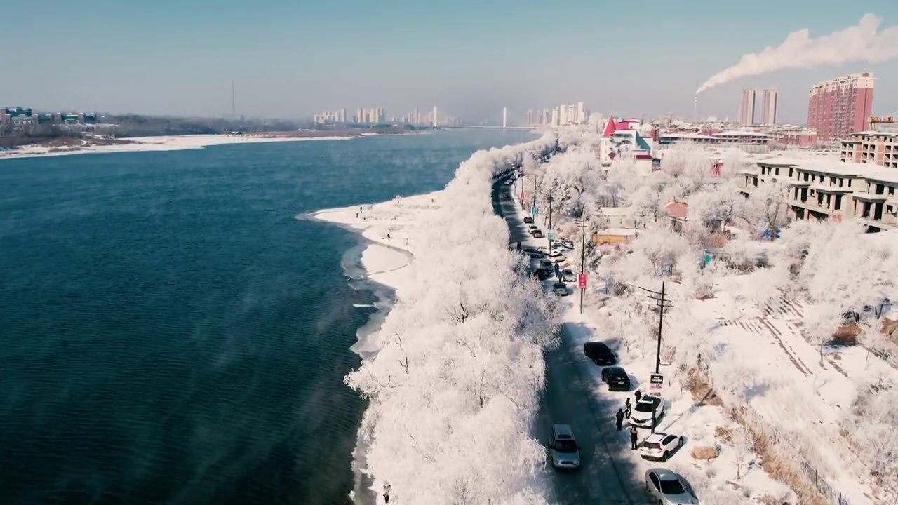 4k吉林雾凇航拍雪乡树挂松花江冬季风光视频素材