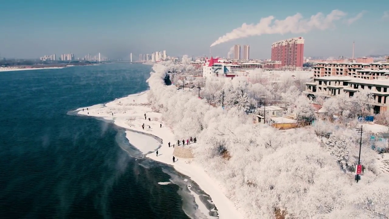 4k吉林雾凇航拍雪乡树挂松花江冬季风光视频素材