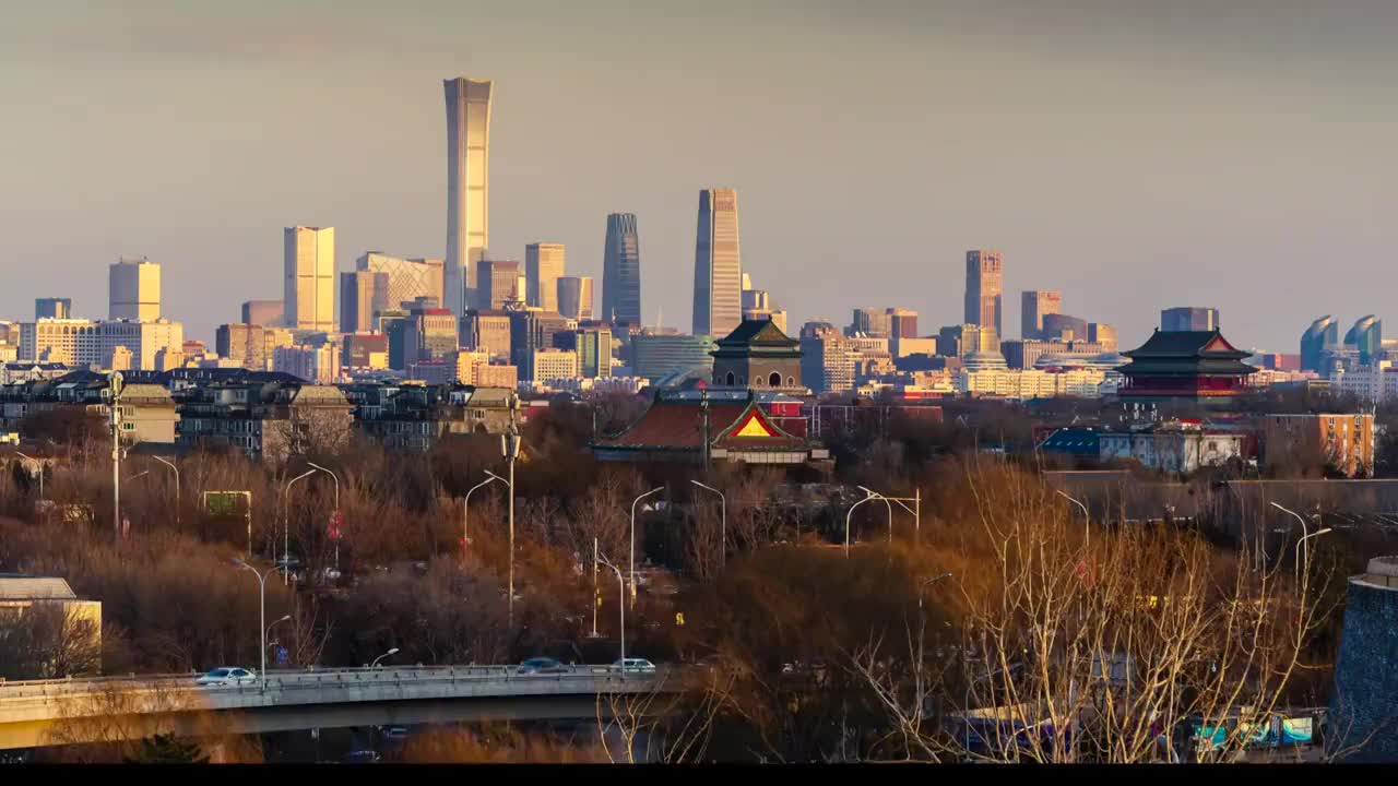 傍晚夕阳下的北京德胜门鼓楼CBD延时视频素材