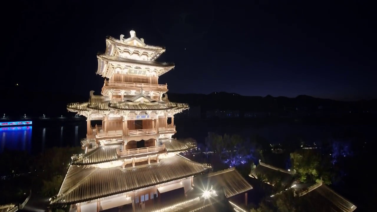 航拍夜晚丽水市区瓯江滨江景区应星楼夜景视频素材