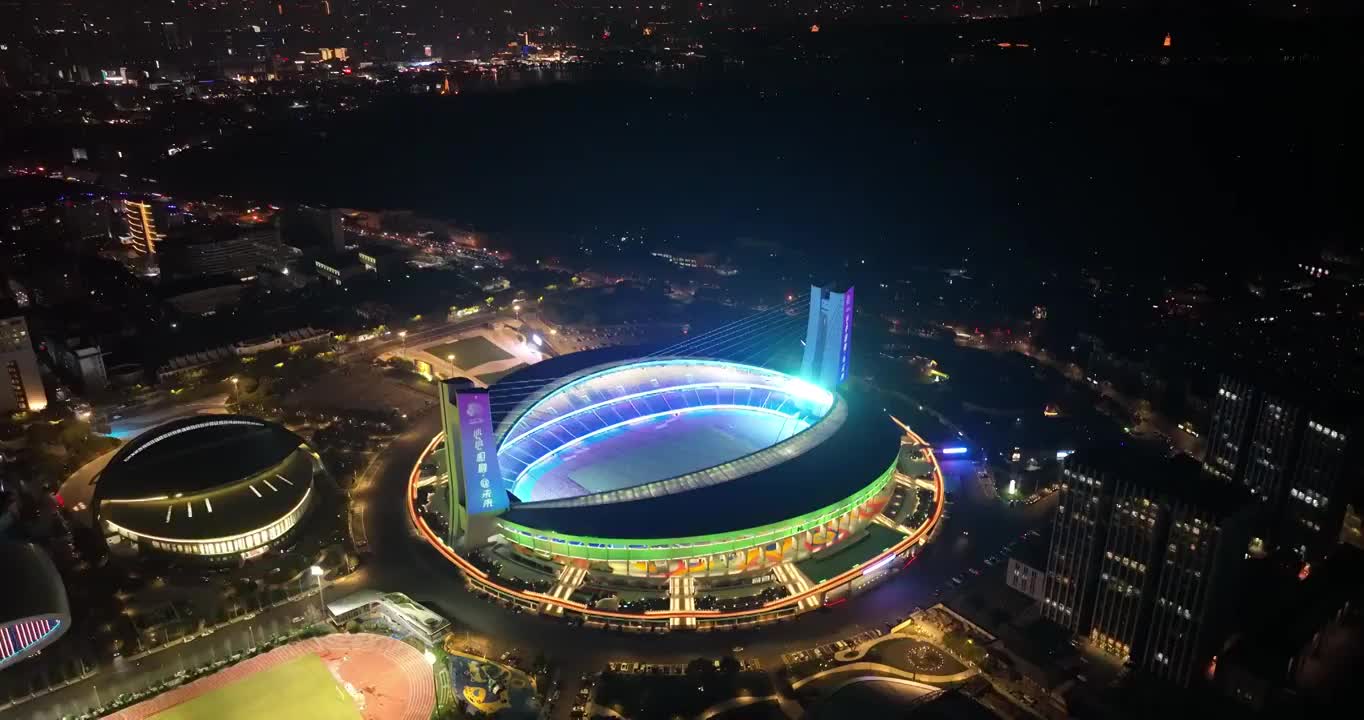 航拍杭州亚运场馆黄龙体育中心夜景视频素材