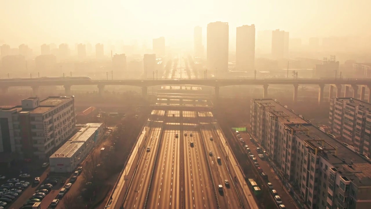 辽宁沈阳城市交通日出马路与高铁航拍视频素材