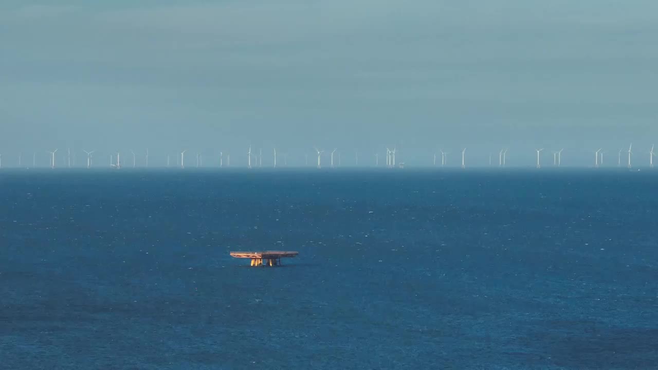 长焦视角平潭岛海面风力发电机视频素材