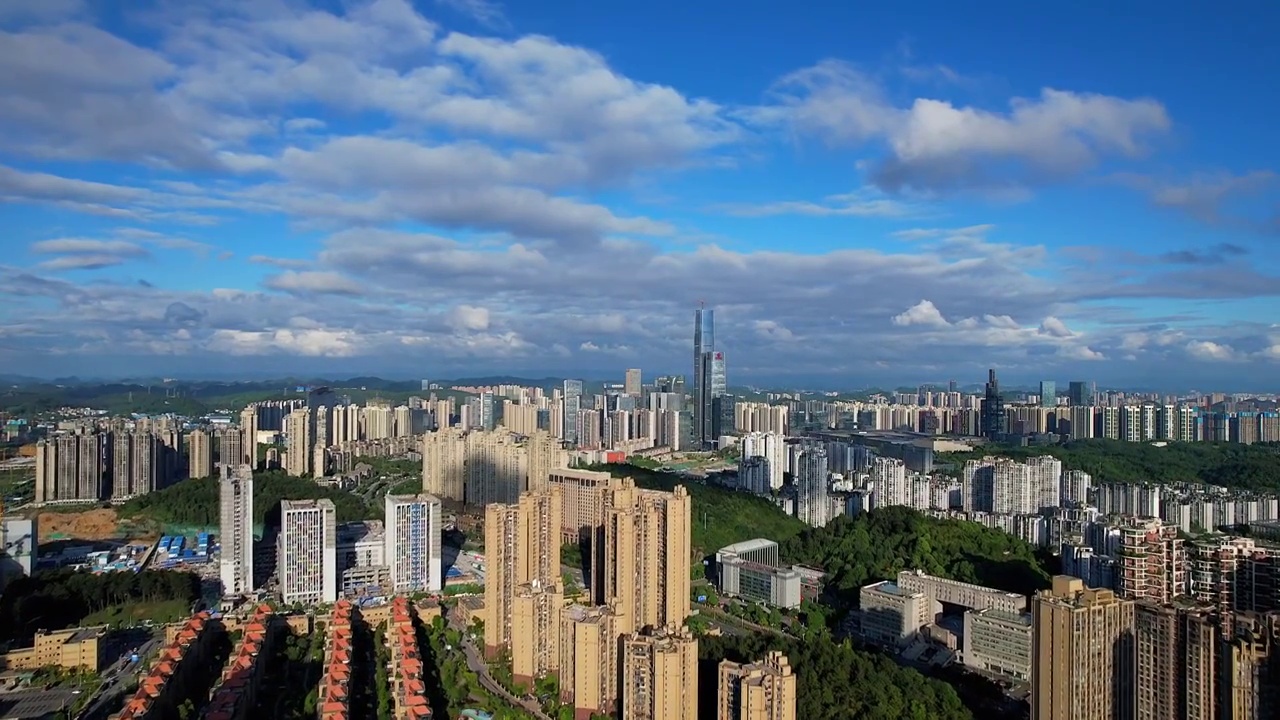 贵州省贵阳市观山湖区金融城地标蓝天白云多角度航拍视频素材