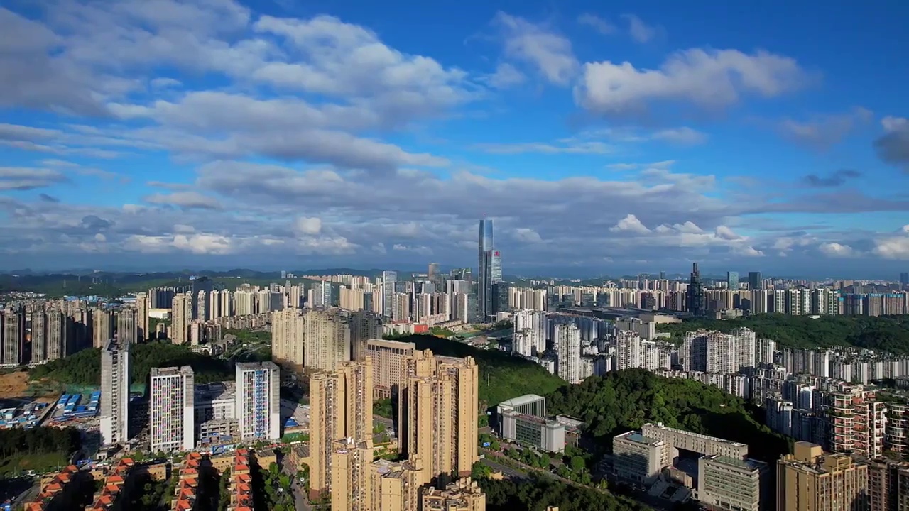 贵州省贵阳市观山湖区金融城地标蓝天白云多角度航拍视频素材