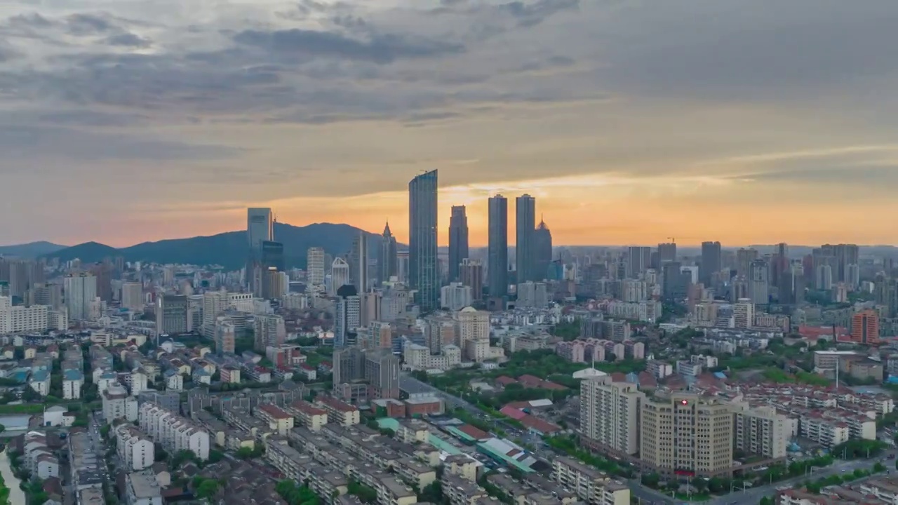 长三角地区江苏省无锡市城市建筑航拍延时日落风光视频素材