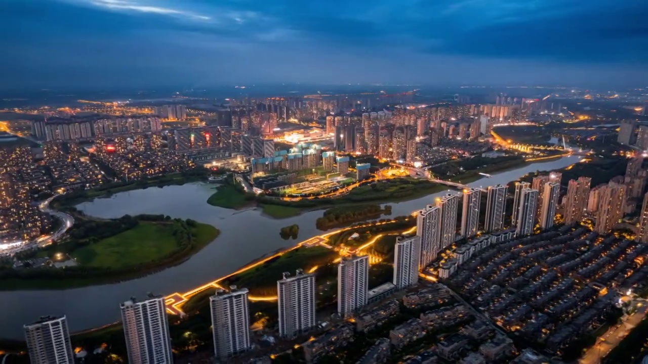 辽宁沈阳沈北新区蒲河沿岸城市夜景航拍延时视频素材