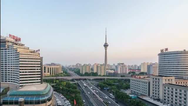 日转夜 北京航天桥 中央电视塔 车流 灯光延时摄影视频下载