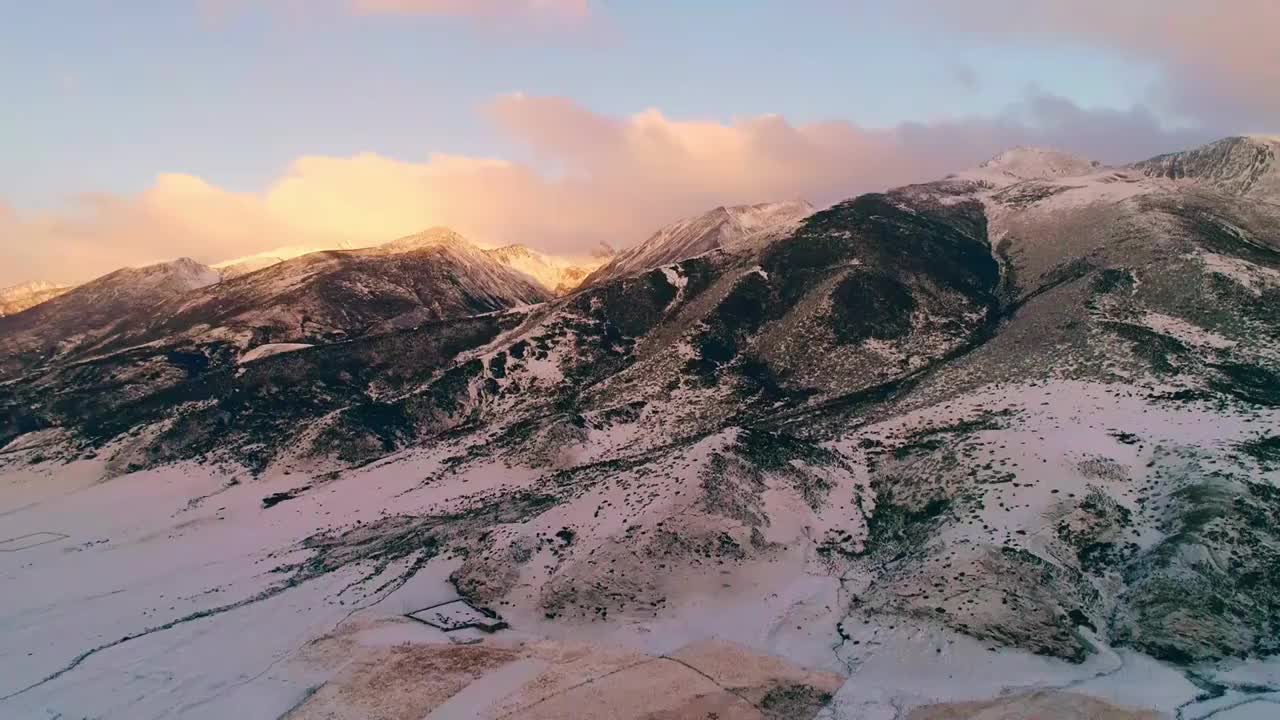 四川甘孜州雪山日出航拍延时视频素材