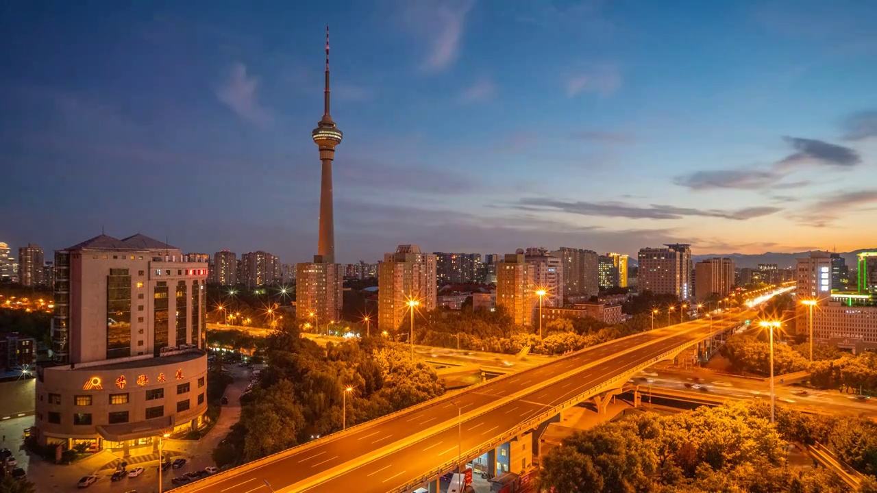 绝美的中央电视塔和航天桥立交桥日落城市风景延时视频素材