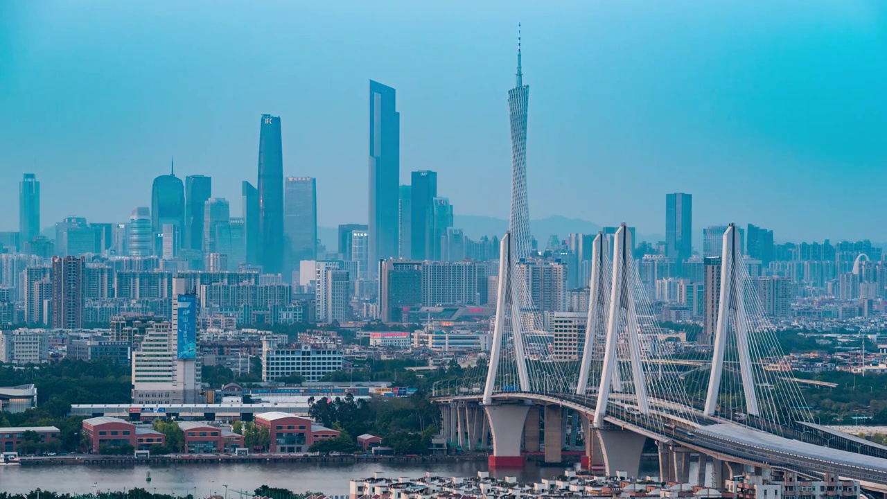 广州洛溪大桥和广州地标建筑夜景视频素材