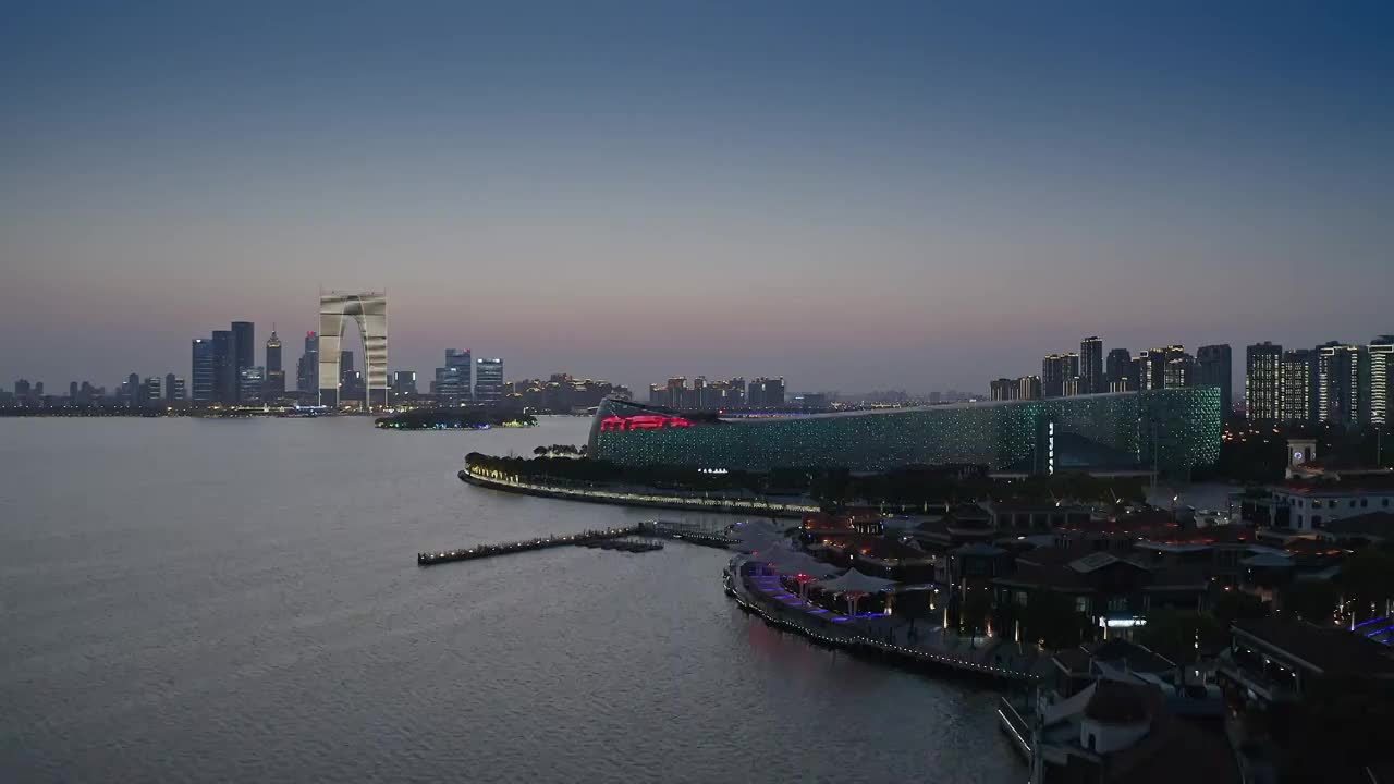 航拍苏州东方之门与金鸡湖夜景视频素材