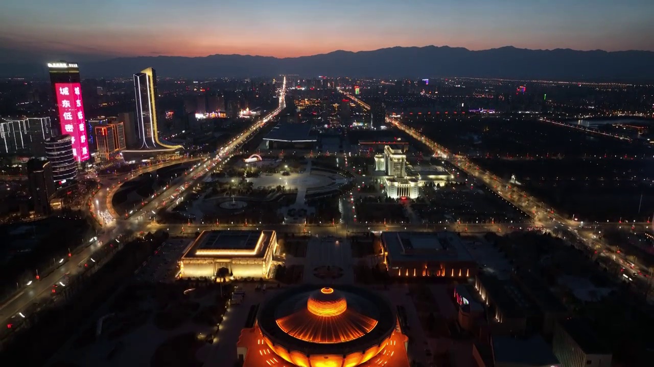 航拍宁夏银川市中心公共建筑群城市风光夜景视频素材